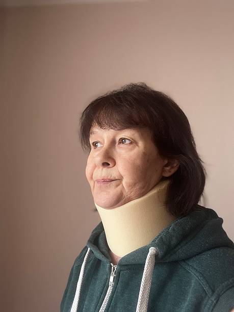 istock Woman wearing neck brace 2204459816