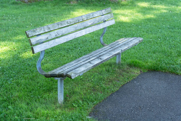 istock Bench for pedestrians in park 2204463911