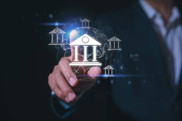 istock Digital banking and financial technology E-governance technology concept, Businessman hand holding virtual e-governance icon Ensuring secure e-governance of business in the era of global connectivity 2204467700