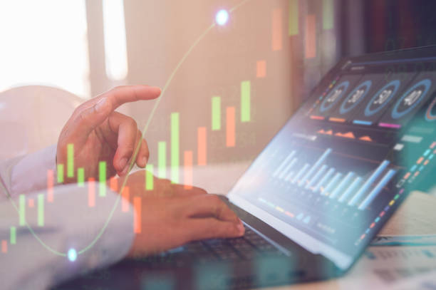 istock investment financial concept Business finance data analytics graph.Financial management technology.Advisor using KPI Dashboard on virtual screen, man using computer laptop working with data charts 2204470255