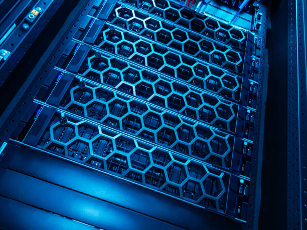 istock Detailed View of Server Rack with Blue Lighting and Hexagonal Design 2204474000