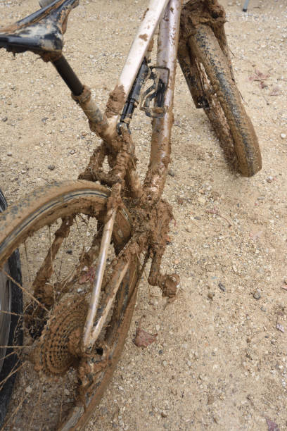 istock bike dirty with mud after a race 2204475110