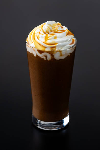 istock Caramel Frappe Against Black Background 2204475778
