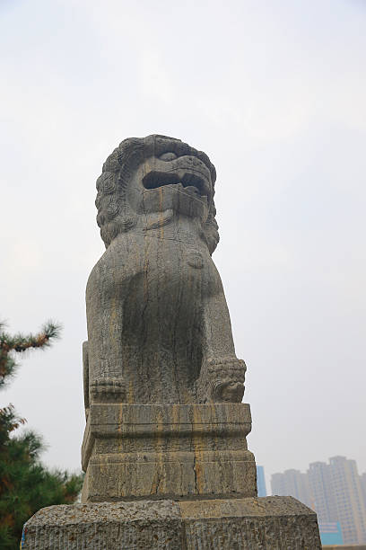 istock Stone lion carving craftsmanship in China 2204477304