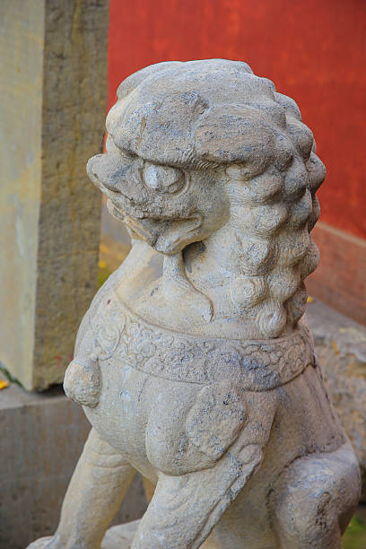 istock Stone lion carving craftsmanship in China 2204477437