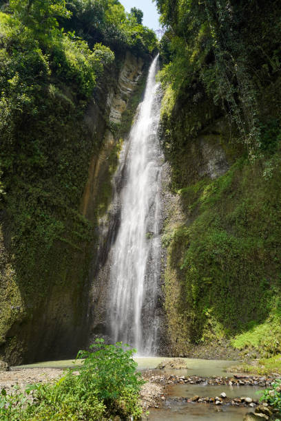 istock curug sidoharjo or widoharjo waterfall, kulon progo, Yogyakarta, Indonesia 2204481329