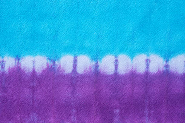 istock tie dye pattern hand dyed on cotton fabric abstract background. 2204483937