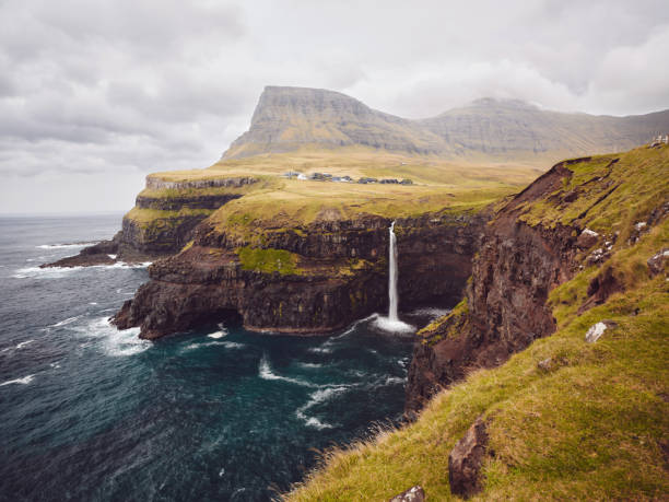 istock Mulafossur Waterfall at Faroe Islands. 2204484712