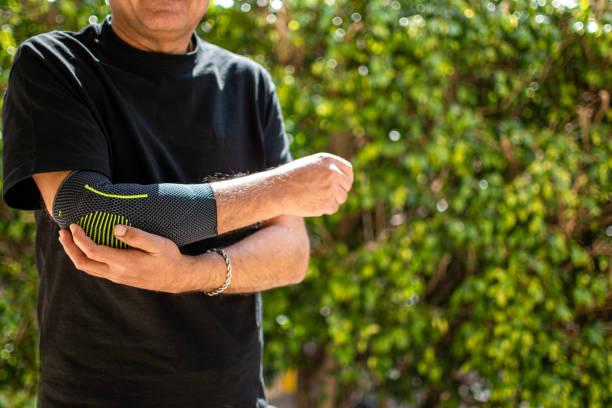 istock Bandage on elbow. First aid and medicine concept 2204496449