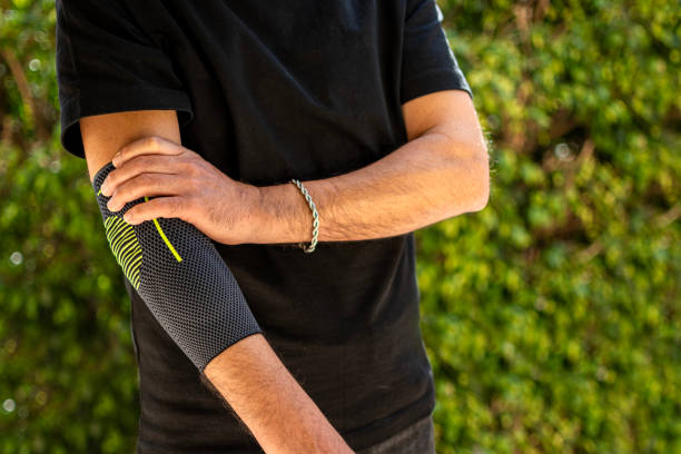istock Bandage on elbow. First aid and medicine concept 2204497206