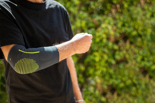 istock Bandage on elbow. First aid and medicine concept 2204497477