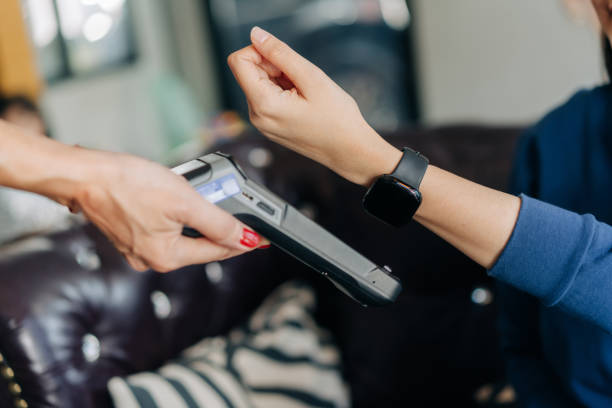 istock Contactless Smartwatch Payment at Restaurant Checkout 2204497482