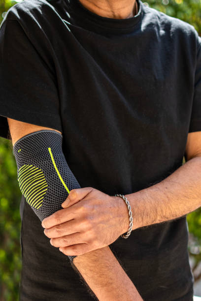 istock Bandage on elbow. First aid and medicine concept 2204497568