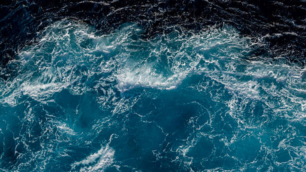 istock Vibrant Aerial View of Ocean Waves With Dynamic White Foam Patterns 2204498156