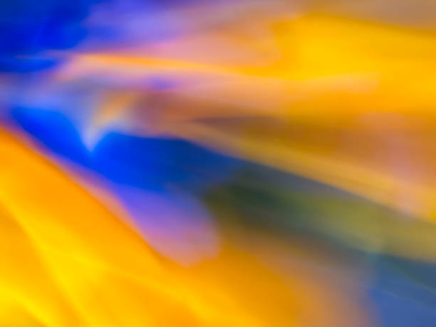 istock Vibrant interplay of warm and cool tones creating a dynamic abstract composition in an artistic exploration of color 2204498893