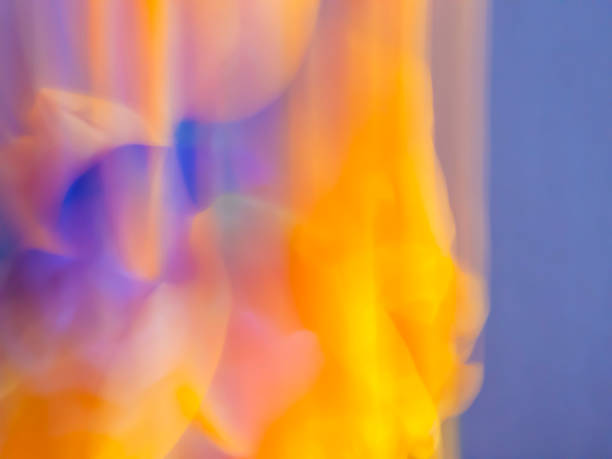 istock Vibrant interplay of colors in a dynamic abstract composition with warm tones and soft forms 2204499090