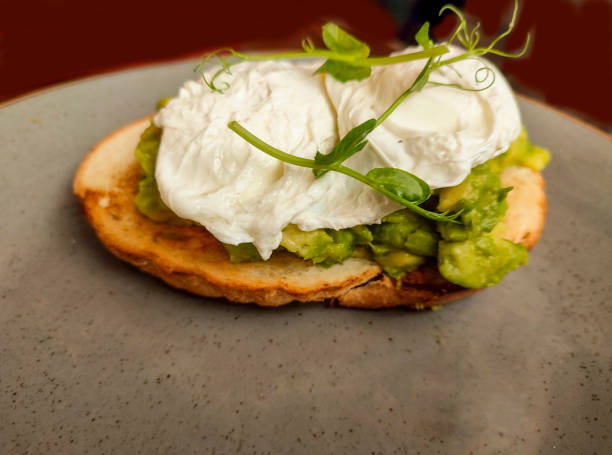 Traditional poach egg toast breakfast servings at glasgow scotland england