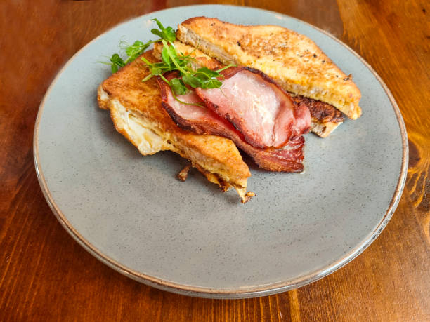 istock Traditional poach egg toast breakfast servings at glasgow scotland england 2204503690