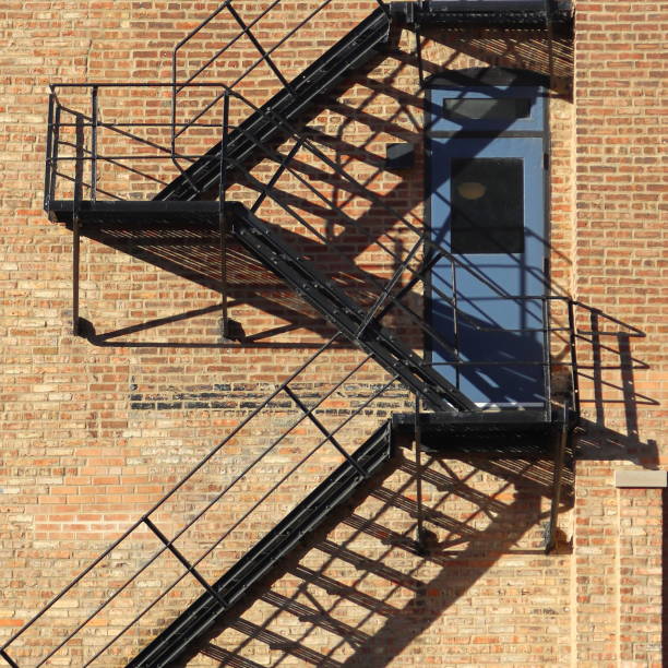 istock Blue Door to the Fire Escape 2204505704