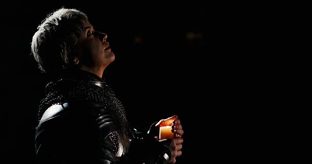 A mesmerizing futuristic scene featuring a character enveloped in deep darkness and mystery