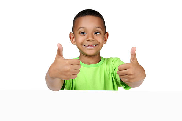 istock Cute american boy with blank board on white background 2204507328