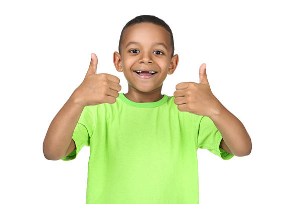 istock Cute american boy showing thumb up on white background 2204507726