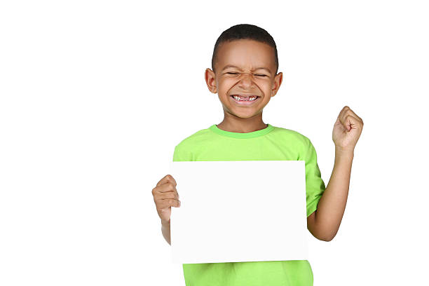 istock Cute american boy with blank board on white background 2204508472