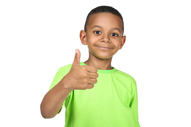 istock Cute american boy showing thumb up on white background 2204508756