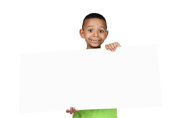 istock Cute american boy with blank board on white background 2204509347