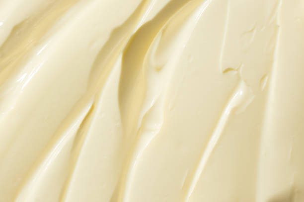 istock Creamy Mayonnaise Texture Abstract Culinary Background 2204509365