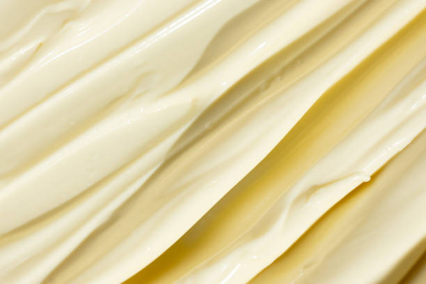 istock Creamy Mayonnaise Texture Abstract Culinary Background 2204509369