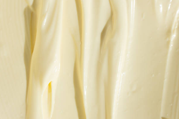 istock Creamy Mayonnaise Texture Abstract Culinary Background 2204509373