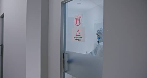 istock Laboratory Entrance Featuring Important Caution Signage for Safety and Awareness 2204511135