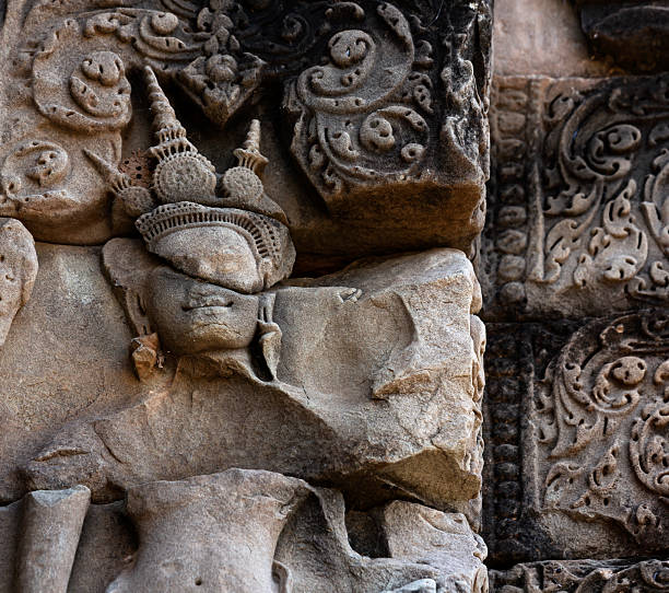 istock cracked image of female figure on the facade 2204514682
