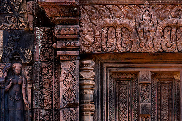 istock Lady dressed in traditional attributes guards the temple door 2204514811