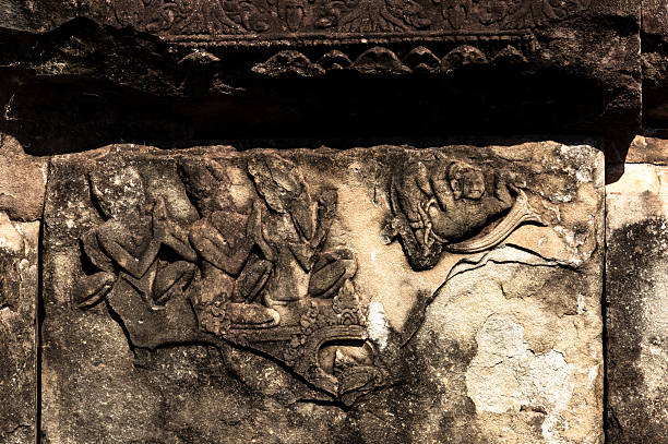 istock vanished figures on the wall praying to a flying character 2204514907