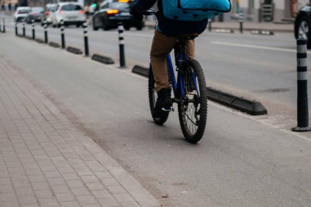 istock A dedicated bicycle lane with a clear road marking and directional arrow, emphasizing urban cycling infrastructure and sustainable transportation 2204516477