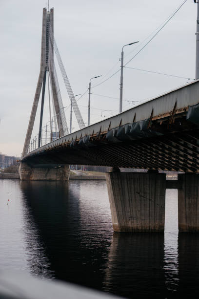 istock A striking perspective of a cable-stayed bridge over a calm river, showcasing urban infrastructure and architectural design 2204517246