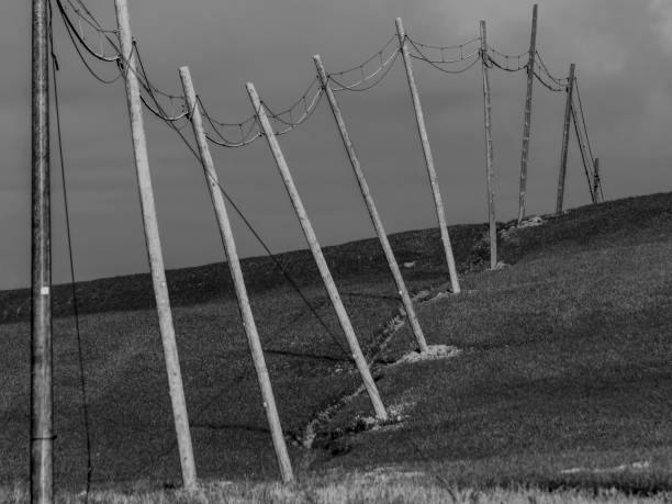 Montecastrilli, Terni, Umbria, Italy: Old power line with wooden poles