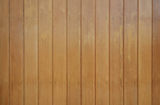 Old vintage red brown wood lath wall cladding for background and texture images.