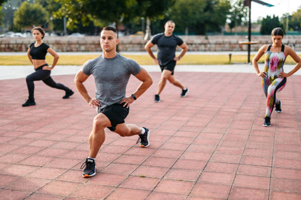 istock A Fitness Group Exercising Outdoors 2204524331