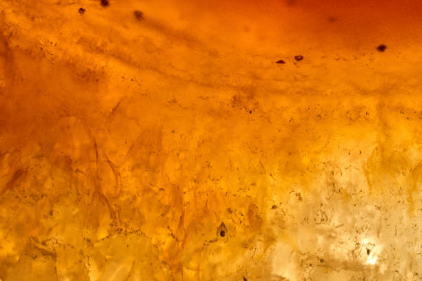 Agate macro detail. close-up of a textured semi-precious gemstone background. backlight transparency
