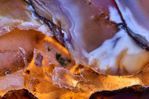 istock Agate macro detail. close-up of a textured semi-precious gemstone background. backlight transparency 2204535844