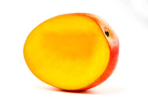 Fresh mango isolated on white background. Skin shot of ripe sweet tropics fruits in Taiwan. Ripe sweet tropics fruits studio shot. Yellow, red colors for background use.