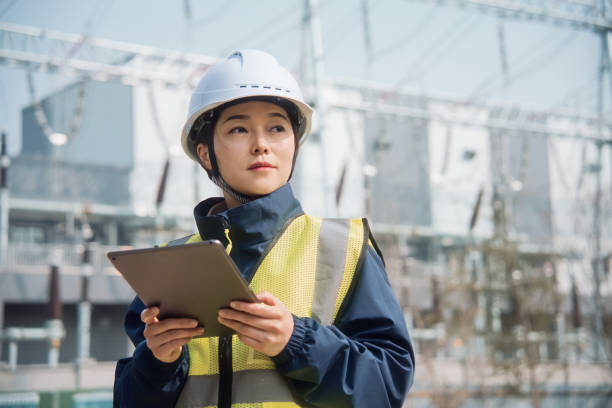 istock Female engineer`working on the power station with digital tablet 2204536222
