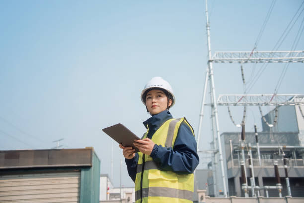 istock Female engineer`working on the power station with digital tablet 2204536231