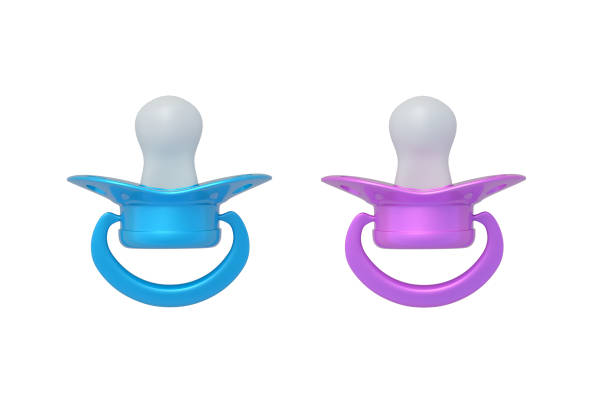 istock Pair of baby pacifiers isolated on white background. Newborn accessory. Top view. 3d render 2204536531