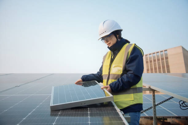 istock asian female engineer working in solar power station 2204536570