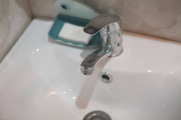 faucet with water tap in bathroom