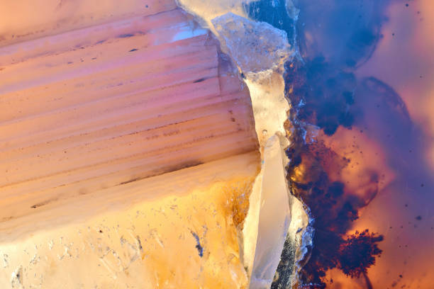 istock Agate macro detail. close-up of a textured semi-precious gemstone background. backlight transparency 2204539182